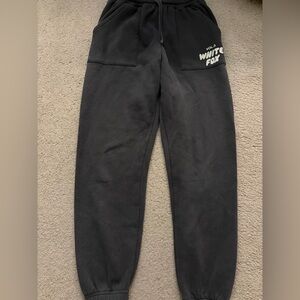 White Fox sweatpants, cuffed at bottom